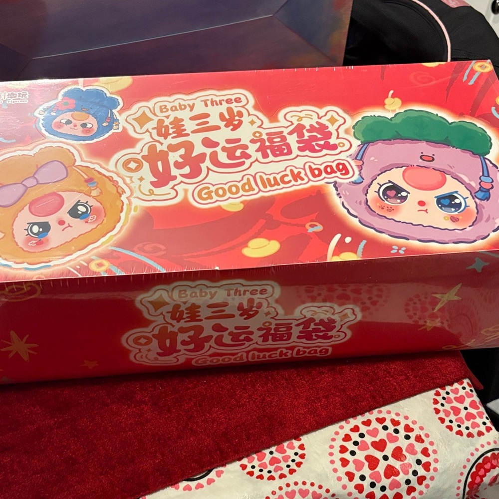 Baby 3 Good luck bag case of 8 unopened could have secret; photos are examples